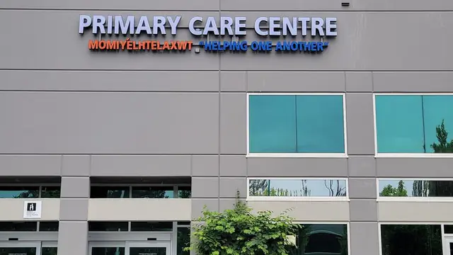 The Chilliwack and Fraser Health Rural Primary Care Centre in Chilliwack, British Columbia, with the Primary Care Centre sign and Momíyelhtelaxwt, Helping One Another