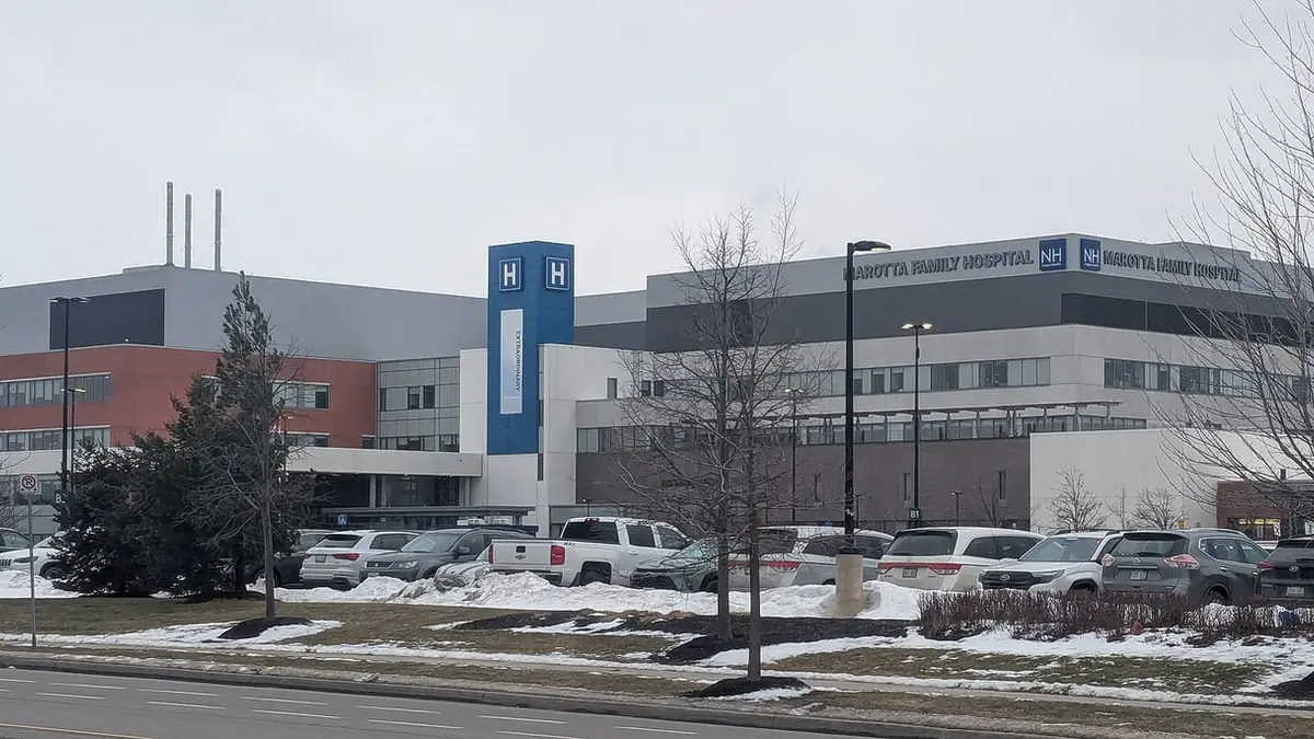 Front of Marotta Family Hospital in St. Catharines, Ontario, with the hospital name on the building and a blue H sign