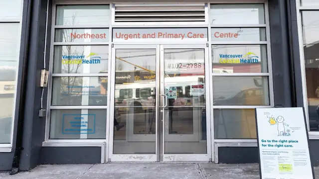 The glass entrance of Northeast Urgent and Primary Care Centre in Vancouver, British Columbia