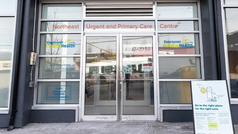 The glass entrance of Northeast Urgent and Primary Care Centre in Vancouver, British Columbia