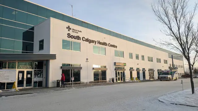 The front of South Calgary Health Centre in Calgary, Alberta, with the urgent care sign above the doors
