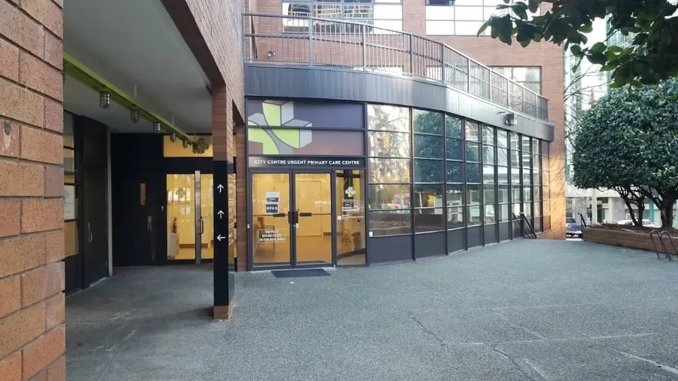 The glass entrance of Vancouver City Centre Urgent and Primary Care Centre in Vancouver, British Columbia