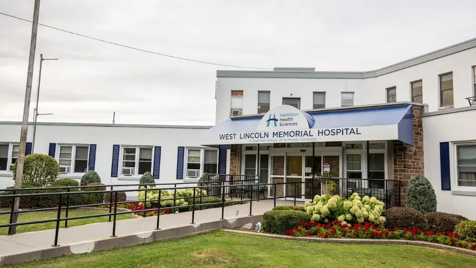 The entrance of West Lincoln Memorial Hospital in Grimsby, Ontario, with the hospital name on the canopy